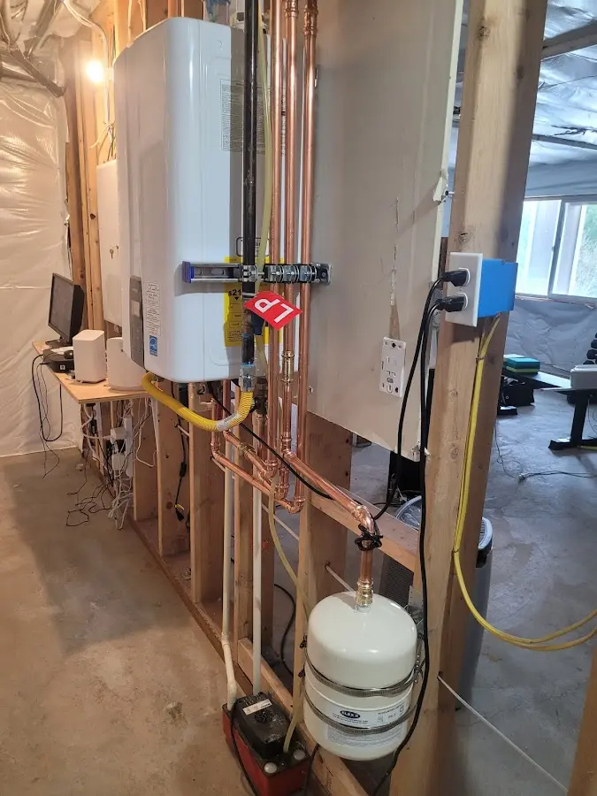 Licensed plumber repairing a kitchen sink in Unadilla